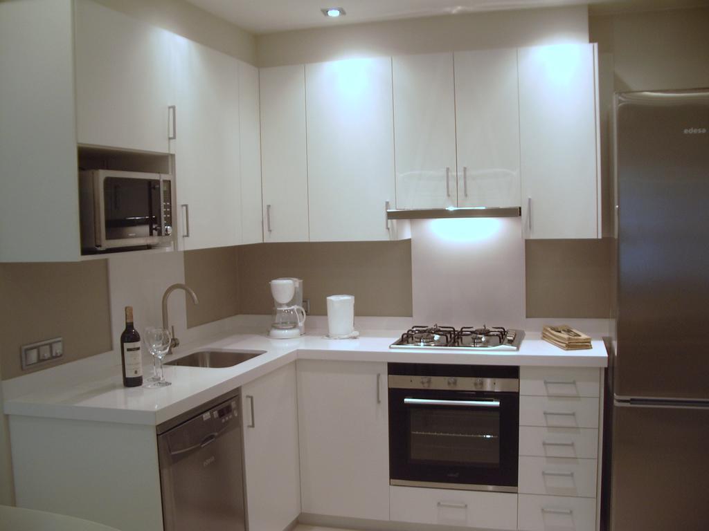 Apartamentos Can Quim L' Escala Bagian luar foto