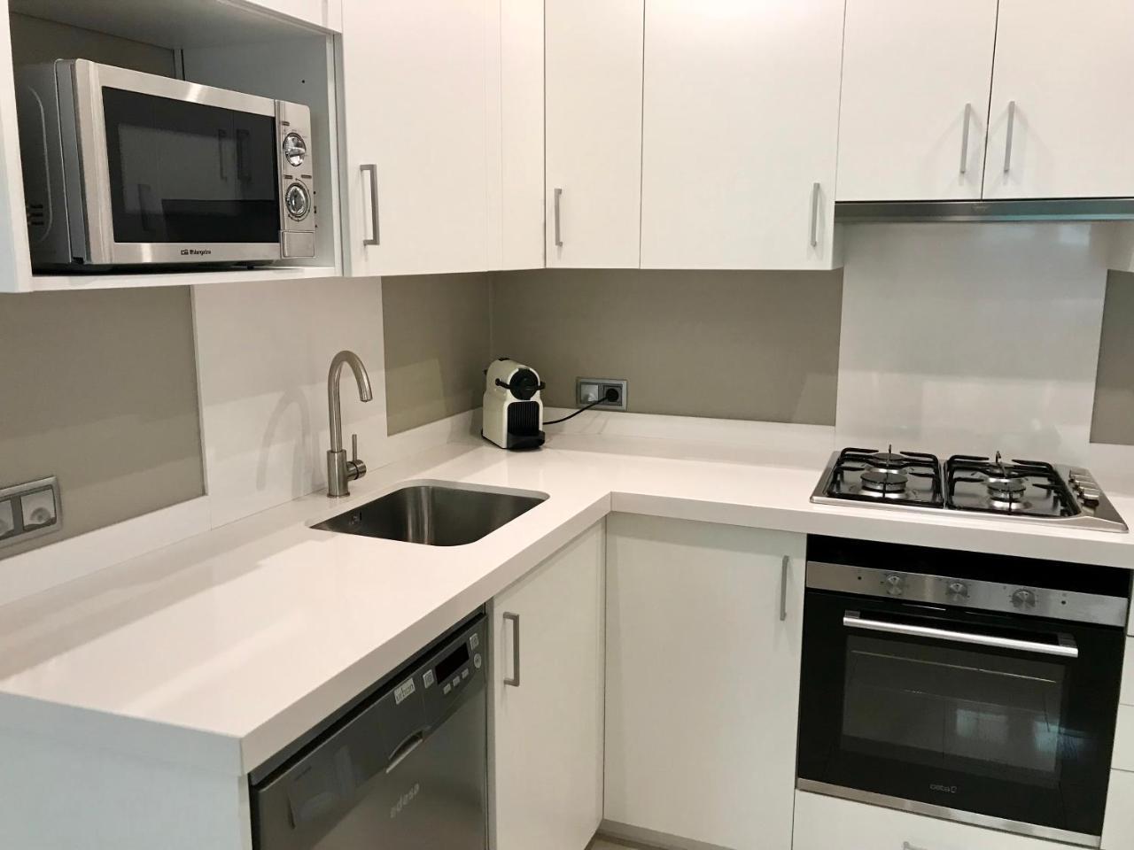 Apartamentos Can Quim L' Escala Bagian luar foto