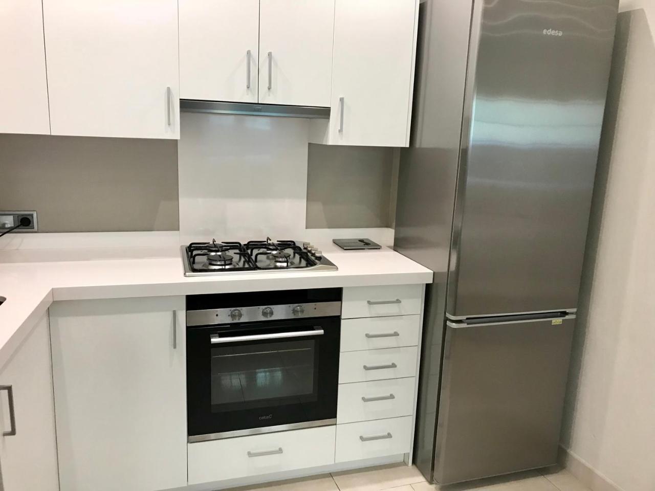 Apartamentos Can Quim L' Escala Bagian luar foto