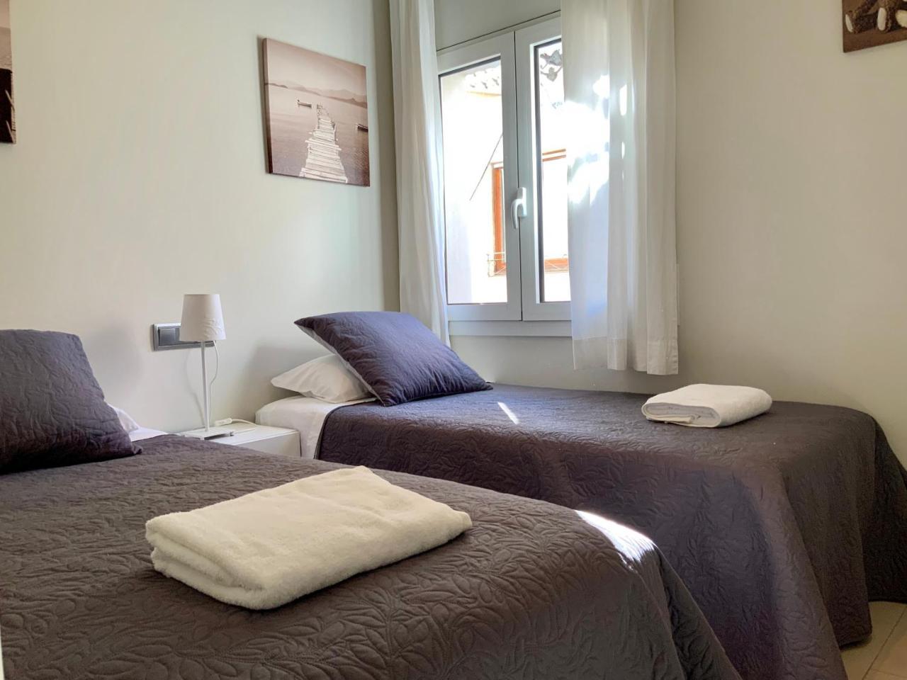 Apartamentos Can Quim L' Escala Bagian luar foto